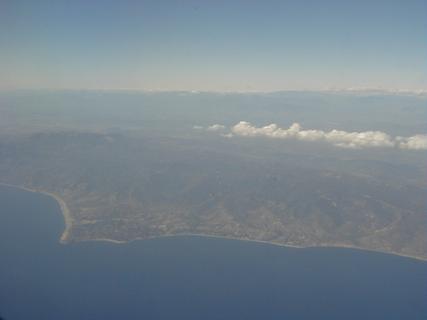 Coastline just north of LA, looking towards Malibu and Point Dume<br>Location: <a href="https://www.google.com/maps/search/?api=1&query=33.97544,-118.77003" target="_new">Over Pacific Ocean</a>